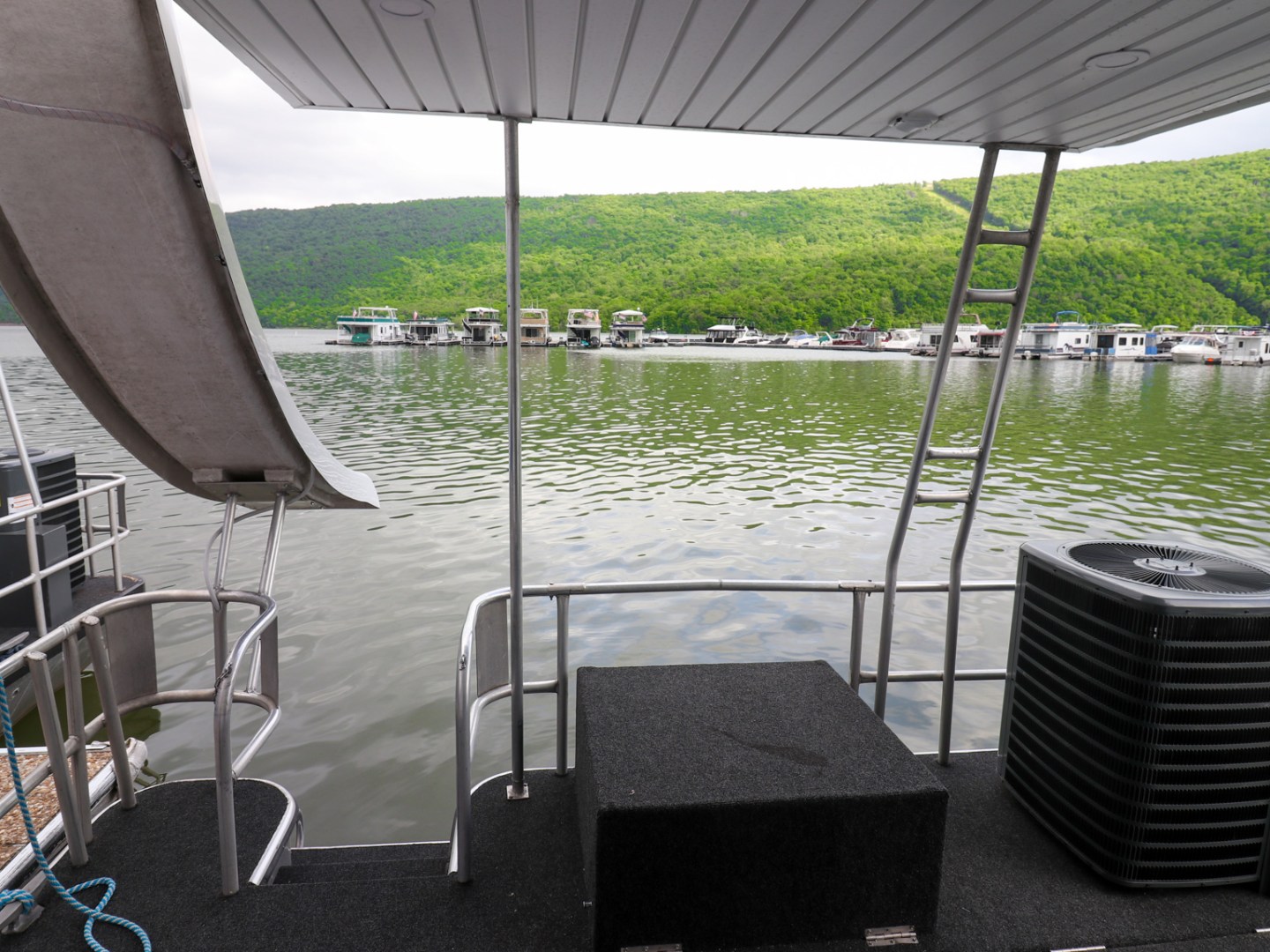 a chair sitting in front of a body of water