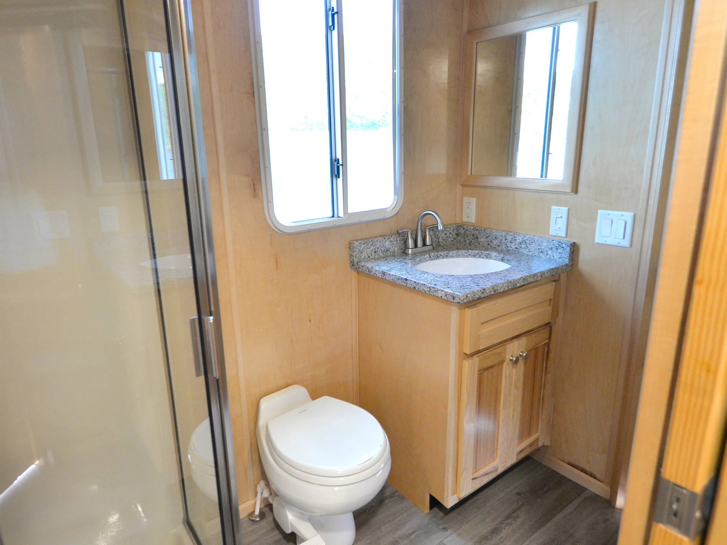 a close up of a shower in a small room