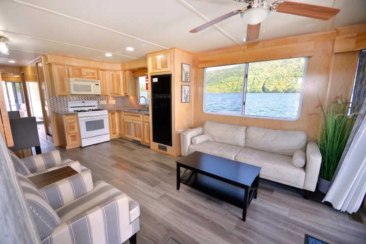 a living room filled with furniture and a fireplace