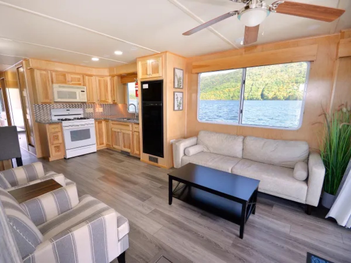 a living room filled with furniture and a fireplace