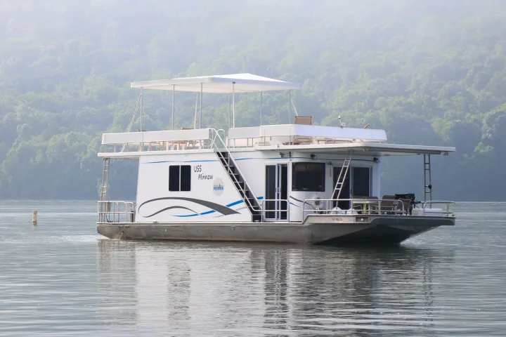 a small boat in a large body of water
